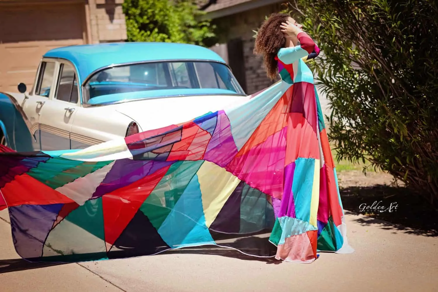 Senior portrait session with a flowing gown and vintage car in the Plano, Dallas area